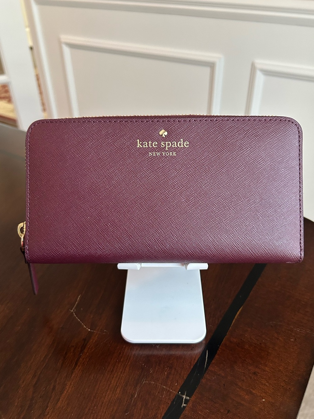 Kate Spade Cedar Street Lacy Mulledwine (588) Zip-Around Wallet with Gold Logo.